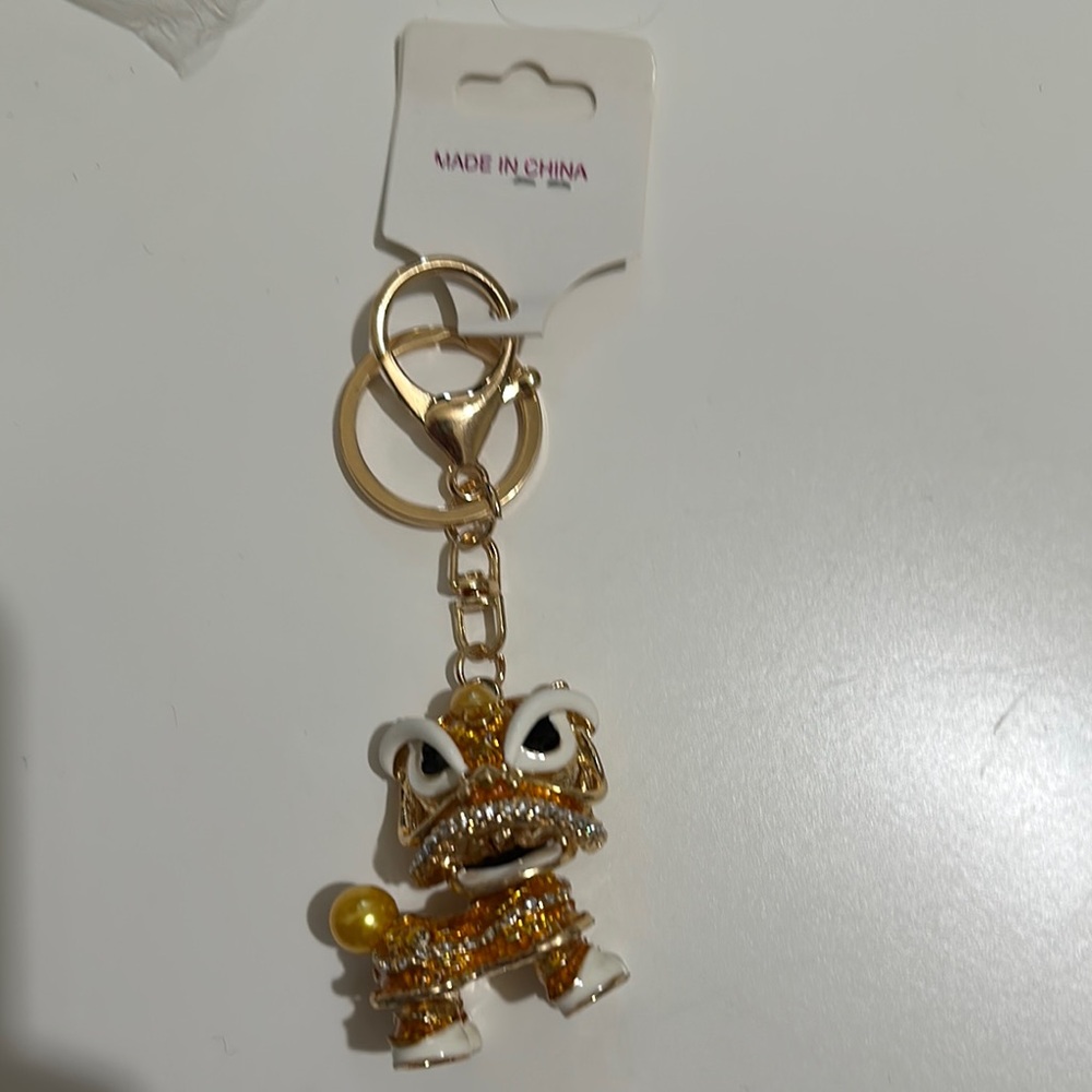 Gold and White Lion Keychain